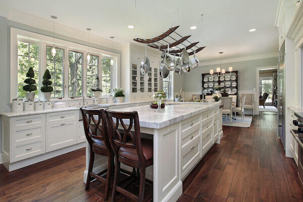 Bigstock- 38333398 - Kitchen in luxury home with white granite island